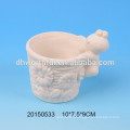 Pot de fleurs en céramique avec figurine de canard